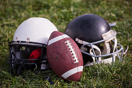 美国的足球头盔和球竞赛体育场场地院子齿轮面具娱乐联盟游戏运动图片