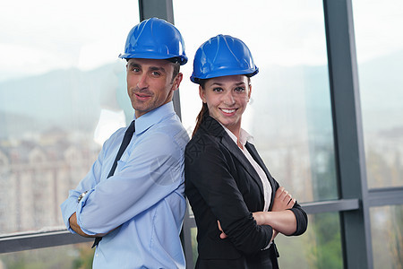 工商界人士和工程师会议参加情况经理伙伴头盔蓝色工人办公室公司生活项目建筑图片
