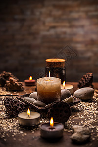 垃圾与健康环境火焰蜡烛棕色燃烧作品石头温泉按摩冥想桌子图片