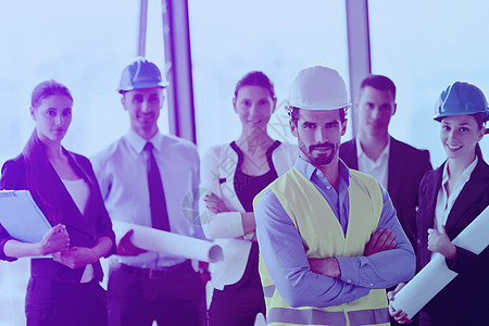 工商界人士和建筑工程师会议讨论的与会者名单蓝色商务蓝图项目微笑办公室团体工人男人经理图片