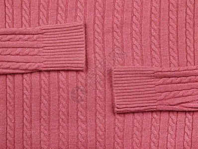 粉色编织羊毛织物的背景纹理图片
