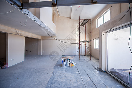 建筑工地内有脚手架地面工具天花板装修工程工作水泥金属框架住宅背景图片
