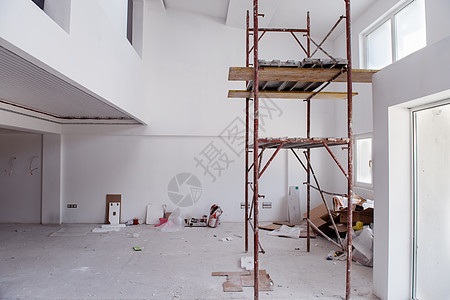建筑工地内有脚手架建筑学框架公寓住宅安全水泥金属梯子材料工程背景图片