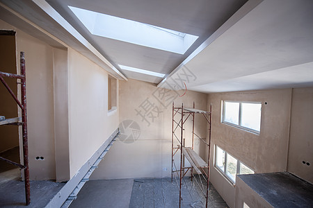 建筑工地内有脚手架装修框架天花板梯子水泥工作金属商业公寓住宅背景图片