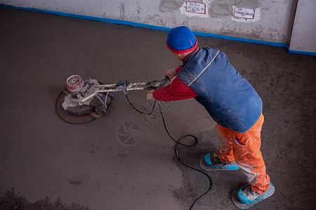 从事和打磨沙子和水泥铲地的工人地板工作建设者砂浆石膏板装修地面工艺加热建筑图片