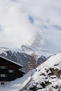 泽尔马特斯维兹兰首脑滑雪日落晴天地标全景蓝色顶峰风景岩石图片