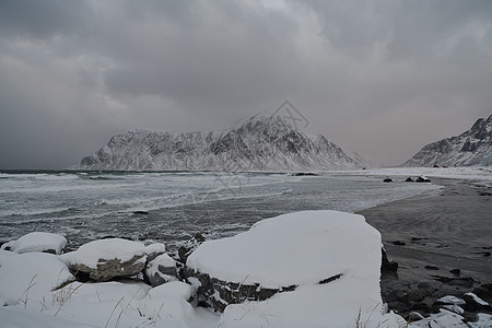 冬季诺华海岸 下雪多云的天气恶劣天空旅游日落风景假期峡湾支撑海岸山峰蓝色图片