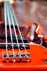 橙色电力低音吉他音乐家钢弦爵士乐棕色吉他手木头音乐歌曲旋律爵士图片