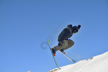 滑雪车速度粉末男人娱乐太阳飞行乐趣天空空气下坡图片