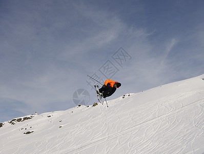 极端自由型滑雪跳乐趣滑雪板滑雪者安全速度夹克蓝色危险风镜山脉图片