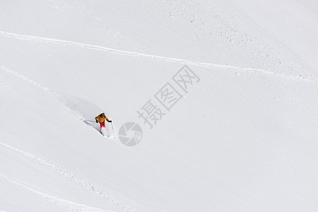 深雪粉雪滑雪者滑雪运动滑雪者冒险假期旅行行动闲暇下坡山脉图片