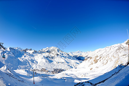 冬天下雪的高山高山首脑爬坡运动风景太阳假期阳光蓝色冻结季节图片