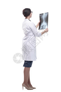 女医生手上拿着X光片的女医生擦洗工作医师成人护士从业者专家x光儿科广告牌背景图片