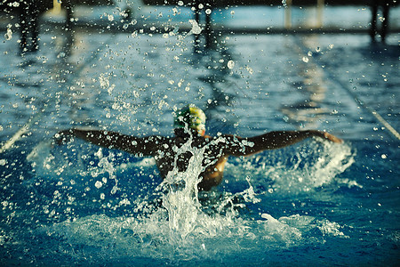 游泳运动员成人锻炼风镜运动男人速度男性娱乐海浪游泳衣背景图片