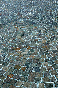 有石砖的街道正方形小路路面卵石建造城市人行道鹅卵石材料大街图片
