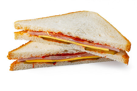 白色的两半三明治夹在白纸上包子营养火腿午餐面包早餐食物小吃图片