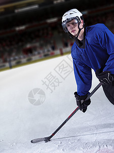 冰冰曲棍球运动员在行动中冰球运动团队闲暇竞赛游戏男性男人活动乐趣图片