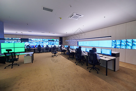 工作中的安全数据中心操作员小组团队控制室展示服务数据团体屏幕监视警卫技术图片