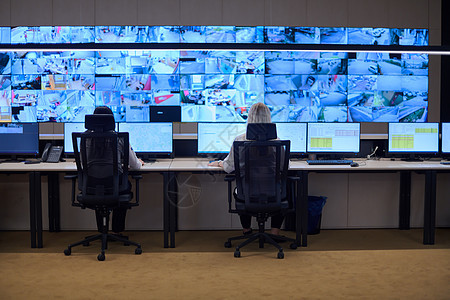 工作中的安全数据中心操作员小组房间车站监督监视数据同事女性监视器警卫监控图片