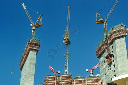 带有起重机的建筑工地财产建造商业办公室摩天大楼进步公寓工作工程建筑物图片