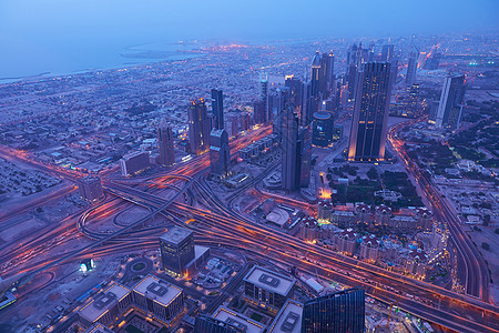 迪拜夜天窗街道摩天大楼城市地标建筑学旅行交通景观海湾办公室图片