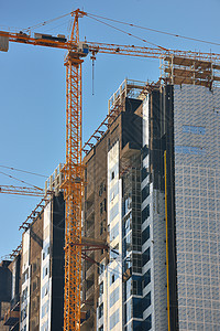 带有起重机的建筑工地工作建筑物工程进步水泥公寓摩天大楼建造框架金属图片