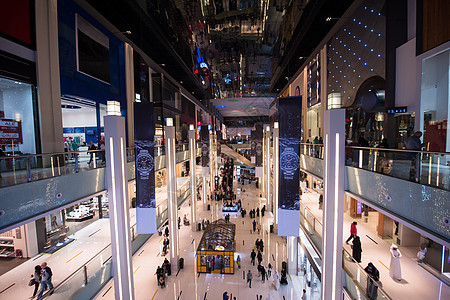 现代购物中心运动展示建筑楼梯销售量店铺顾客窗户地面人群图片