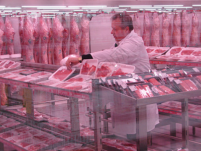 屠宰职业猪肉店铺助理男人销售架子食物包装防护背景