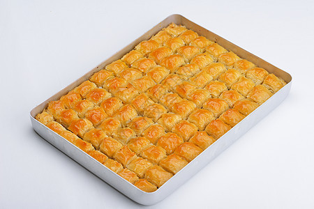 塔基什肉饼甜点开心果盘子榛子蜂蜜情调糖浆面包蜜饼核桃坚果图片