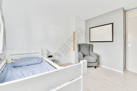 卧室的单张软床财富财产住宅奢华装饰建筑建筑学风格公寓房子背景图片