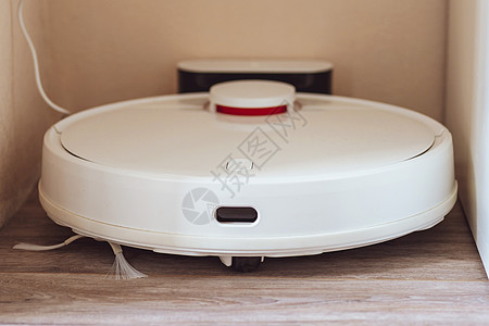 白色真空吸尘器清洁剂 机器人排气装置技术工具清洁工机器器具收费控制房子家政房间图片