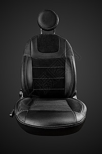 黑色背景隔离的圆头脑偏黑的舒适驾驶车座椅图片
