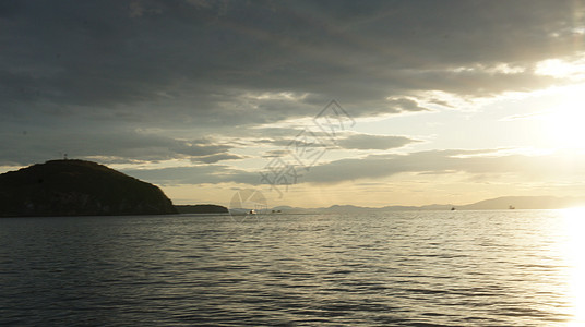 日本海日落 远处的岛屿天空橙色波浪太阳夕阳图片