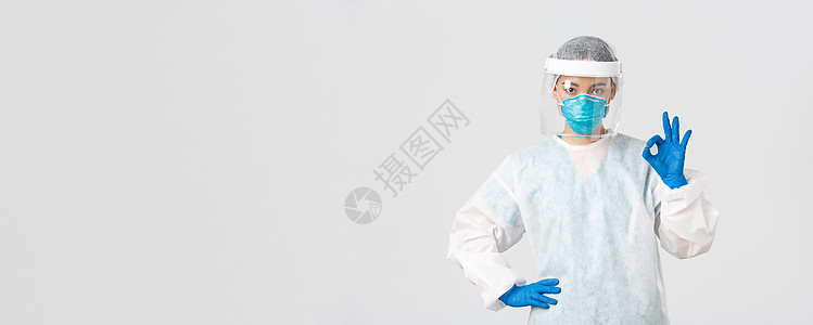 Covid19 冠状病毒病 医护人员的概念 身穿个人防护装备的严肃职业亚洲女医生 摆出好姿态 确保患者安全女性情况病人感染临床医图片