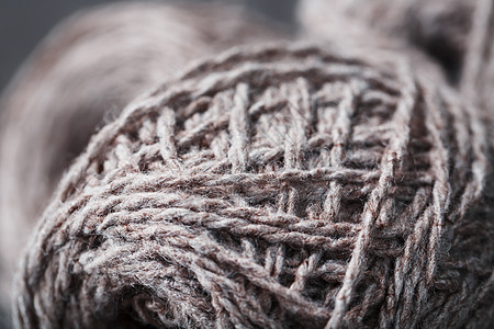 由天然羊毛制成的棕色羊毛线球衣服宏观针织袜纤维短袜纺织品针织鞋类爱好背景图片