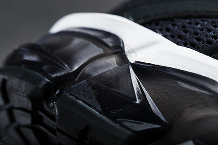 在超现代运动运动鞋底垫衬垫的盖子插件社论衣服活动宏观产品减震夫妻铁人空气跑步图片