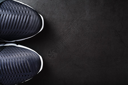 黑色和白色的超现代运动鞋 黑底背面标识衣服橡皮创新鞋带系统空气运动产品社论图片