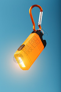 橙色领头手电筒 有一辆汽车 在蓝色背景上发光按钮工作玻璃光束工具照明照片反光板塑料探照灯图片