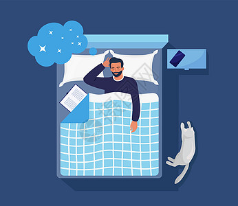 晚上睡觉的人带着书和猫 人睡在羽绒被下的枕头上 和平的梦想和放松 休息时间和舒适的放松 好梦 身体健康控制小憩就寝苏醒羽绒被卧室图片