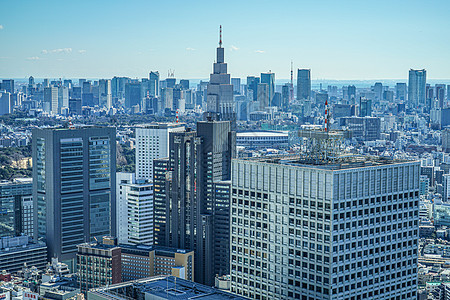 从东京市政厅天文台看到东京市风景的东京城景建筑群摩天大楼建筑景点蓝天办公楼商业街景城市旅游图片