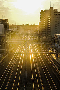 日落城市景和跟踪图像乡愁美景交通相模铁线橙子车辆线路电力电线图片