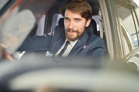 正式的客运司机道路成功者服务丰盛驾驶电话出租车男性商业成人商务套装成功人士图片