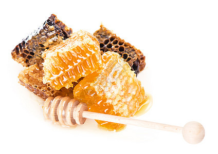 蜂蜜和小麦蜂蜜 蜂蜜与蜜薄饼隔绝在白色背景上木头液体橙子食物药品甜点玻璃勺子蜂窝糖浆图片