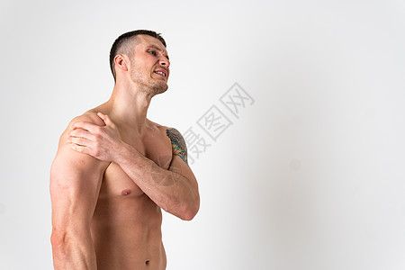 白人男性肩关节肌肉酸痛 背景酸痛 背痛 男性健康压力大 手持 坚持腰椎疗法 问题受宠图片