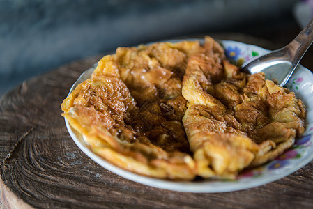 泰国街头餐饮店泰式煎蛋卷盘子美食食物菜单街道午餐油炸餐厅烹饪背景图片