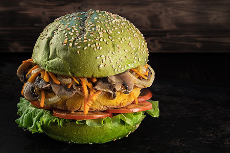 蔬菜汉堡 生菜 肉食素食肉类替代餐具 暗底背景图片
