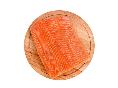 白色背景的木板上的新鲜鲑鱼片 白底 顶视美食木头橙子寿司烹饪鳟鱼牛扒红色鱼片健康图片