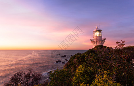澳洲海豹岩的灯塔上升天高清图片
