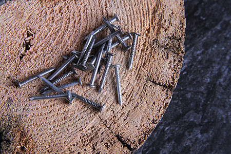 木质的紧身衣 木板上的自制螺丝技术工具木材地面维修插图家具金属木工紧固件图片