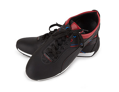 孤立的黑色运动鞋男人橡皮鞋带培训师训练活动跑步鞋类运动网球图片